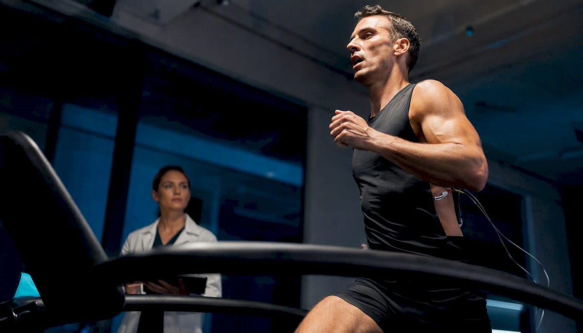 Athlete completing supervised treadmill stress test